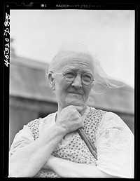 Mrs. Carrie E. Loadwick, lifelong resident of area being taken over by the Army, who is moving to the town of Adams. Leraysville, New York. Sourced from the Library of Congress.