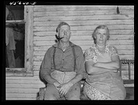 [Untitled photo, possibly related to: Farmer and his wife who live on one of the hill farms east of Burlington, Vermont]. Sourced from the Library of Congress.