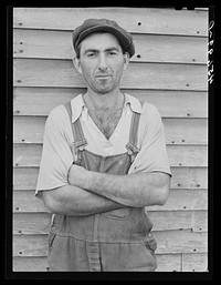William Gaynor, FSA (Farm Security Administration) dairy farmer near Fairfield, Vermont. Sourced from the Library of Congress.