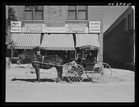 [Untitled photo, possibly related to: Enosburg Falls, Vermont. Shopping on a Saturday afternoon]. Sourced from the Library of Congress.