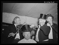 [Untitled photo, possibly related to: A quartet at an old-fashioned musical given at the "World's Fair" at Tunbridge, Vermont]. Sourced from the Library of Congress.