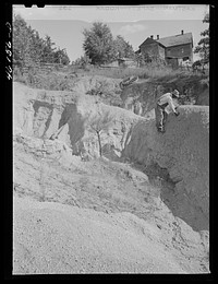 [Untitled photo, possibly related to: Greene County, Georgia. Severe gully erosion on a farm in northwestern]. Sourced from the Library of Congress.