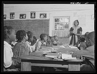 [Untitled photo, possibly related to: Siloam, Greene County, Georgia. Singing class in a  school]. Sourced from the Library of Congress.