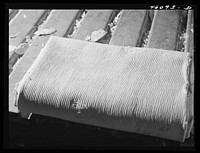 Paper pulp at the Mississquoi Corporation paper mill in Sheldon Springs, Vermont. Sourced from the Library of Congress.