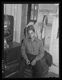 One of the sons of Edgar Jones, FSA (Farm Security Administration) client in Woodville, Greene County, Georgia. He works at the Civilian Conservation Corps camp. Sourced from the Library of Congress.