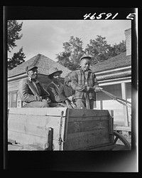 [Untitled photo, possibly related to: Boyd Jones driving into Greensboro for Saturday afternoon. Greene County, Georgia]. Sourced from the Library of Congress.