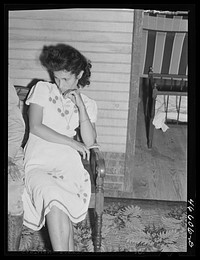 [Untitled photo, possibly related to: Manati, Puerto Rico (vicinity). Wife of a foreman of a sugar plantation in her home]. Sourced from the Library of Congress.