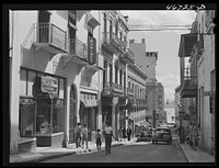 San Juan, Puerto Rico. A street in the shopping district. Sourced from the Library of Congress.