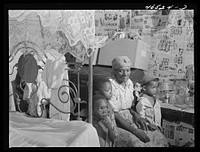 Christiansted, Saint Croix Island, Virgin Islands (vicinity). Family living in one of the slum "villages" which were formerly slave quarters. Sourced from the Library of Congress.