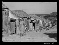 La Vallee, Saint Croix Island, Virgin Islands. A cluster of stone huts which used to be slave quarters. Sourced from the Library of Congress.