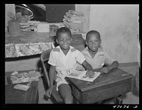 [Untitled photo, possibly related to: Christiansted, Saint Croix Island, Virgin Islands (vicinity). Puerto Rican child in Peter's Rest elementary school]. Sourced from the Library of Congress.