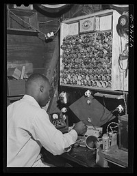 Charlotte Amalie, Saint Thomas Island, Virgin Islands.  radio mechanic who lives in a slum area. Sourced from the Library of Congress.