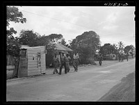 [Untitled photo, possibly related to: Saint Thomas Island, Virgin Islands. Men coming home from work at the Naval base]. Sourced from the Library of Congress.