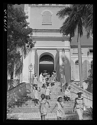 Charlotte Amalie, Saint Thomas Island, Virgin Islands. After a morning church service on Christmas Day. Sourced from the Library of Congress.