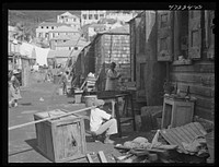 Charlotte Amalie, Saint Thomas Island, Virgin Islands. Painting furniture and cleaning house in a slum section. Sourced from the Library of Congress.