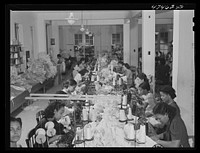 Santurce, Puerto Rico. Women working in the Rodriguez needlework factory where the minimum wage is six dollars a week. Sourced from the Library of Congress.