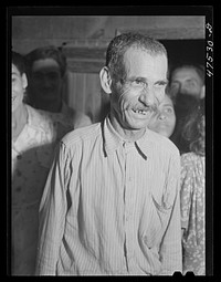 Guanica, Puerto Rico (vicinity). Tenant farmer at a Three Kings' eve party which is an annual event at his home in the sugar country. Sourced from the Library of Congress.