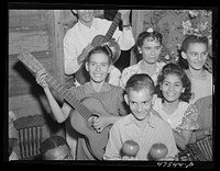 Guanica, Puerto Rico (vicinity). At a Three Kings' eve party in a tenant farmer's home in the sugar country. Sourced from the Library of Congress.