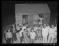 Guanica, Puerto Rico (vicinity) A Three Kings' eve party at the home of a farm labor family. Sourced from the Library of Congress.
