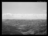 [Untitled photo, possibly related to: Guanica, Puerto Rico. Landscape of country looking south toward the town. The southwestern coast of Puerto Rico is in the background]. Sourced from the Library of Congress.