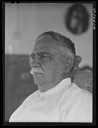 [Untitled photo, possibly related to: Guanica, Puerto Rico (vicinity). Don Luis Quinones, member of an old Puerto Rican family. His house was used as headquarters by the American forces of occupation in the Spanish-American War. He is the father of a FSA (Farm Security Administration) supervisor]. Sourced from the Library of Congress.