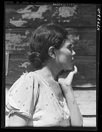 [Untitled photo, possibly related to: Arecibo, Puerto Rico (vicinity). Farm laborer's wife in the sugar cane country]. Sourced from the Library of Congress.
