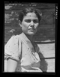 Arecibo, Puerto Rico (vicinity). Farm laborer's wife in the sugar cane country. Sourced from the Library of Congress.