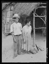 [Untitled photo, possibly related to: Utuado, Puerto Rico (vicinity). FSA (Farm Security Administration) borrower and his wife living in the hills]. Sourced from the Library of Congress.