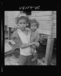 [Untitled photo, possibly related to: San Juan, Puerto Rico. In the huge slum area known as "El Fangitto"]. Sourced from the Library of Congress.