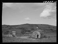 [Untitled photo, possibly related to: Barranquitas (vicinity), Puerto Rico. Tobacco barn on the farm of a FSA (Farm Security Administration) borrower]. Sourced from the Library of Congress.