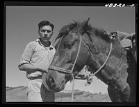 [Untitled photo, possibly related to: Rio Piedras (vicinity), Puerto Rico. Union organizer who was visiting a FSA (Farm Security Administration) sugar cane cooperative]. Sourced from the Library of Congress.