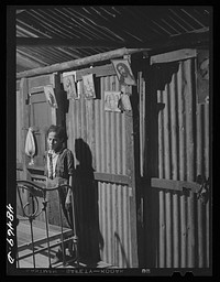 Rio Piedras (vicinity), Puerto Rico. Wife of a FSA (Farm Security Administration) borrower. Sourced from the Library of Congress.