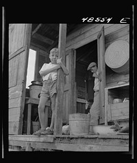 [Untitled photo, possibly related to: San Juan, Puerto Rico. El Fangitto, the slum area]. Sourced from the Library of Congress.