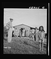 [Untitled photo, possibly related to: Caguas, Puerto Rico (vicinity). A borrower and his family]. Sourced from the Library of Congress.