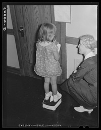 [Untitled photo, possibly related to: Clinic in Greenbelt, Maryland for preschool checkups]. Sourced from the Library of Congress.