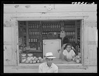 [Untitled photo, possibly related to: Bayamon, Puerto Rico (vicinity). A roadside stand]. Sourced from the Library of Congress.