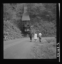 Passing small privately owned coal mine on way to town Saturday afternoon. Mohegan, West Virginia. Sourced from the Library of Congress.