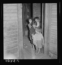 Mexican miner's children in doorway of home. See 50315-E. Bertha Hill, West Virginia. Sourced from the Library of Congress.