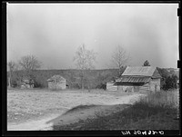 [Untitled photo, possibly related to: Barn being remodeled on farm purchased for rehabilitation client near Raleigh, North Carolina (county supervisor at right)]. Sourced from the Library of Congress.