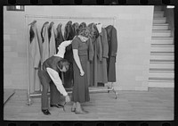 [Untitled photo, possibly related to: Measuring girl for a coat in cooperative garment factory at Jersey Homesteads, Hightstown, New Jersey] by Russell Lee