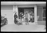 [Untitled photo, possibly related to: Consumer's cooperative. The homesteaders have their own kosher meat shop and grocery, which they expect to enlarge as the colony grows. This picture shows manager, Nathan Dubin, doing a flourishing business in his temporary store. Jersey Homesteads, Hightstown, New Jersey] by Russell Lee