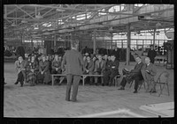 Director of information, Jersey Homesteads, speaking to visitors of the factory, Hightstown, New Jersey by Russell Lee
