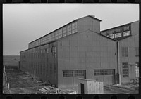 [Untitled photo, possibly related to: This building will house the new canning industry to be put into operation in 1937 at Jersey Homesteads, Hightstown, New Jersey] by Russell Lee
