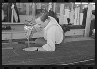 Philip Goldstein assistant cutter in the cooperative garment factory at Jersey Homesteads, is secretary of the Colonists' Association, the workers' Aim Cooperative Association, Inc. Hightstown, New Jersey by Russell Lee