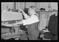 [Untitled photo, possibly related to: Proprietor of tailor shop at steam presser, University Place near 11th Street, New York City] by Russell Lee