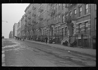 View of 139th Street, east of St. Anne's Avenue, note baby carriages, New York by Russell Lee
