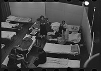 [Untitled photo, possibly related to: Visiting day in an improvised hospital for flood refugees at Sikeston, Missouri] by Russell Lee