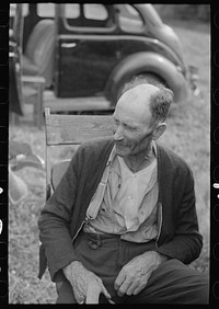 An old farmer at Sparlin's auction sale, Orth, Minnesota by Russell Lee