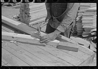 Food storage plant. Jig for making food storage gable ends and trusses. Southeast Missouri Farms Project by Russell Lee