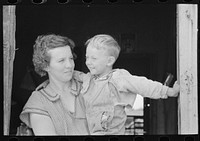 [Untitled photo, possibly related to: Mother and child former sharecropper, now FSA (Farm Security Administration) clients, Southeast Missouri Farms] by Russell Lee
